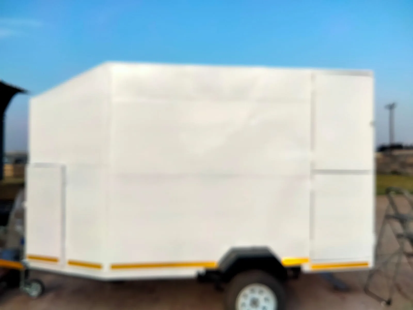 Finished enclosed white trailer