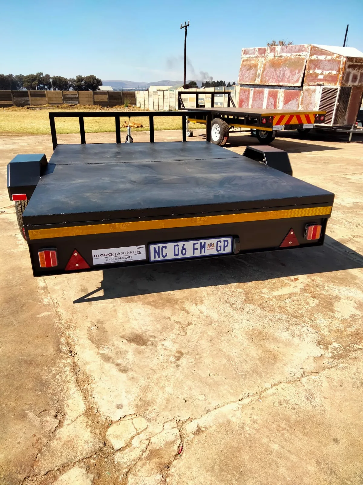 Finished black flatbed trailer
